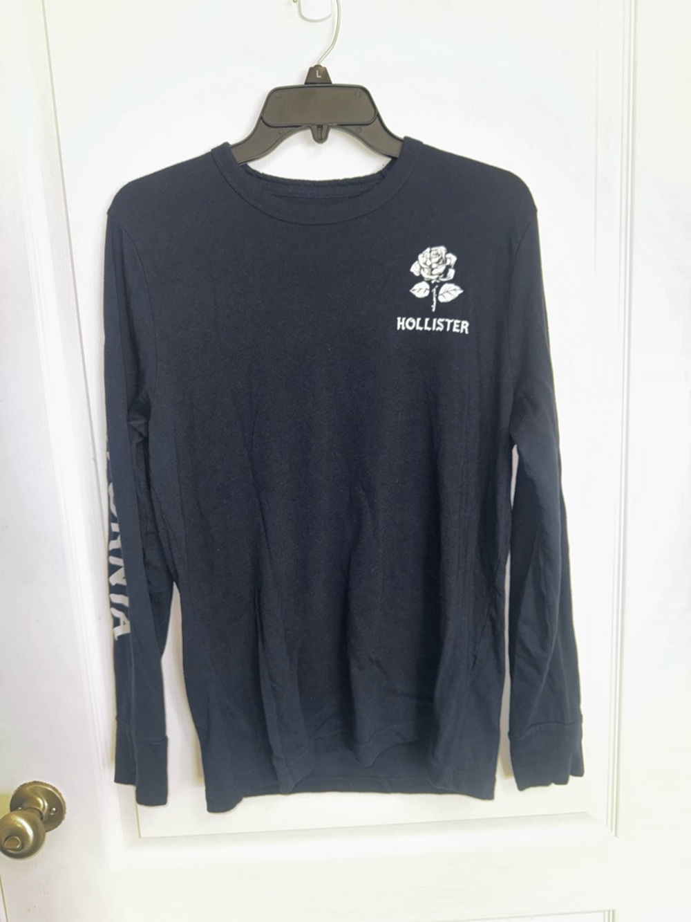 Hollister Black Crewneck Sweater with White Rose Graphic